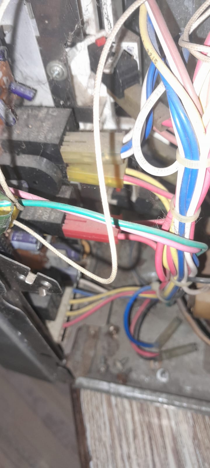 Home appliance repair technician at work